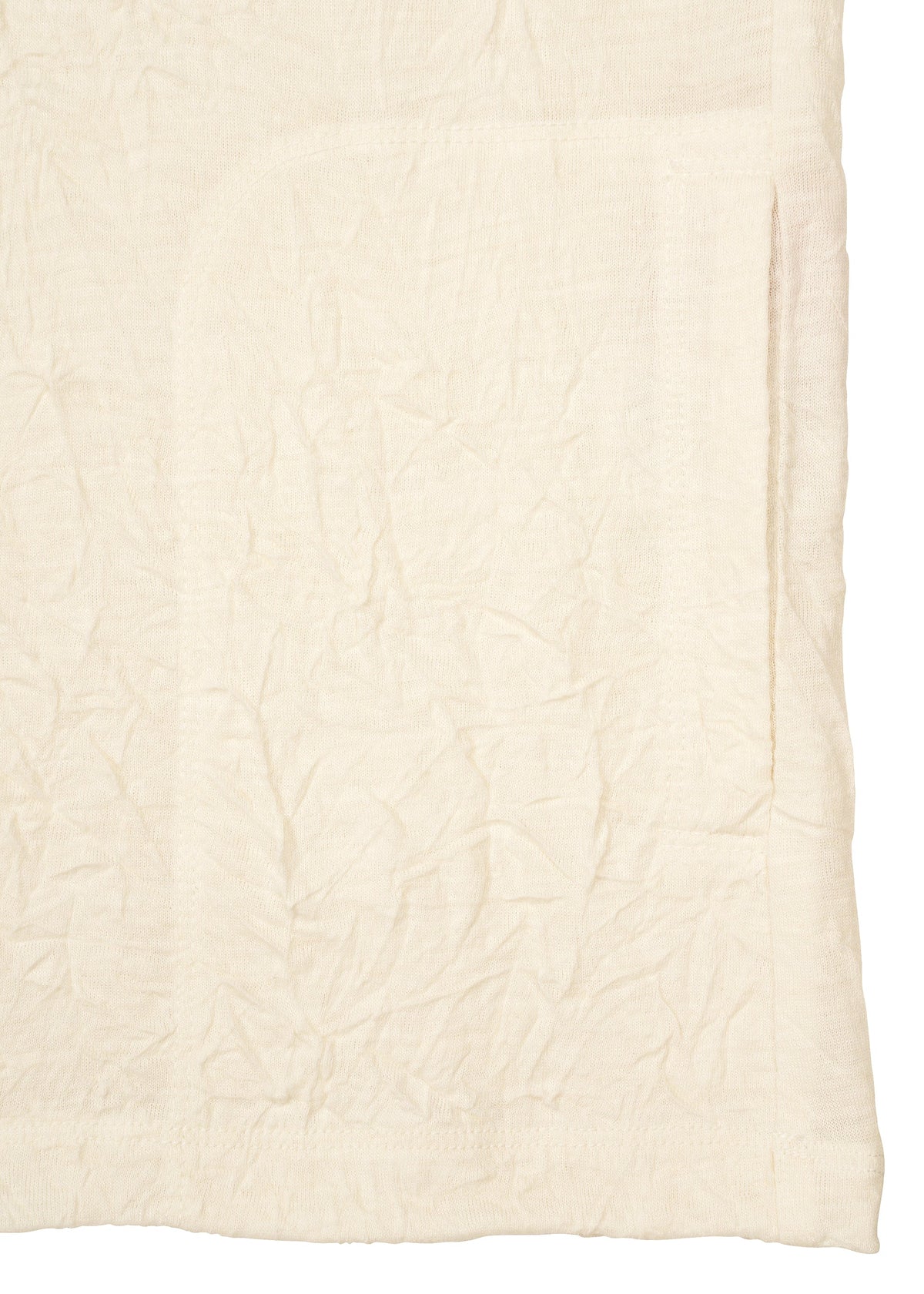 A close-up of HaaT’s W/P WASHER fabric showcases its soft, crumpled white wool jersey texture with visible creases and intricate stitching, evoking the cozy feel of a premium long-sleeved top. view 5 of 8