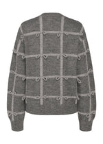 The RIBBON KNIT by HaaT is a gray fulled wool cardigan with a light gray grid pattern and small tied ribbons at each grid intersection, shown from the back.