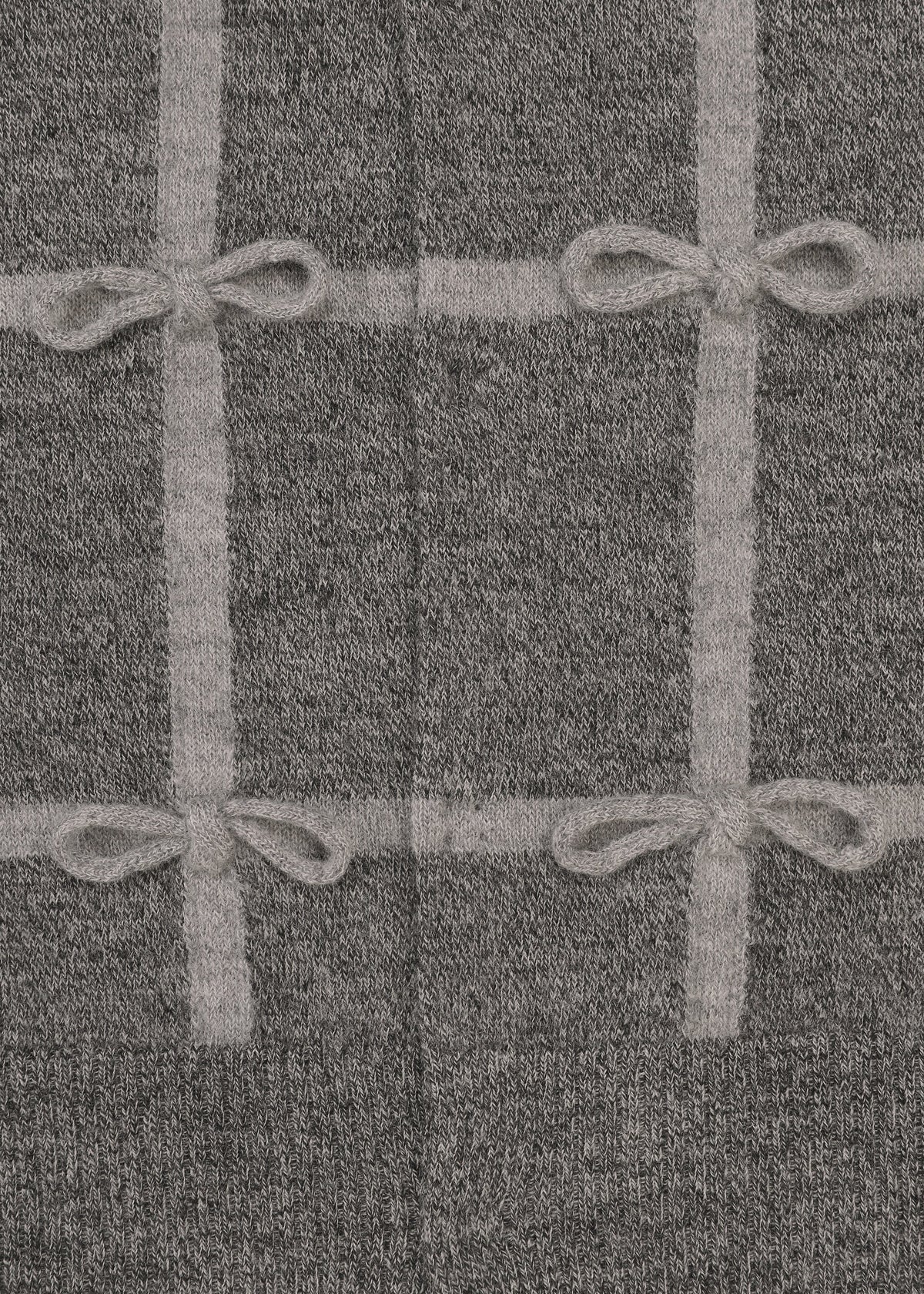 Zoomed view The RIBBON KNIT by HaaT is a gray checkered knit fabric with intersecting light gray lines and bow-like designs in select squares—perfect for a stylish long-sleeved cardigan.