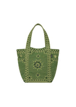 The DAZZLE MIRROR BOX by HaaT is a green mini tote bag adorned with decorative yellow floral and geometric patterns. It features two handles and a small tag on the right side, with symmetrical Bhill embroidery showcased on the front—a testament to the craftsmanship of Indian artisans. The bag is presented against a white background. - MOSS GREEN （no.63）