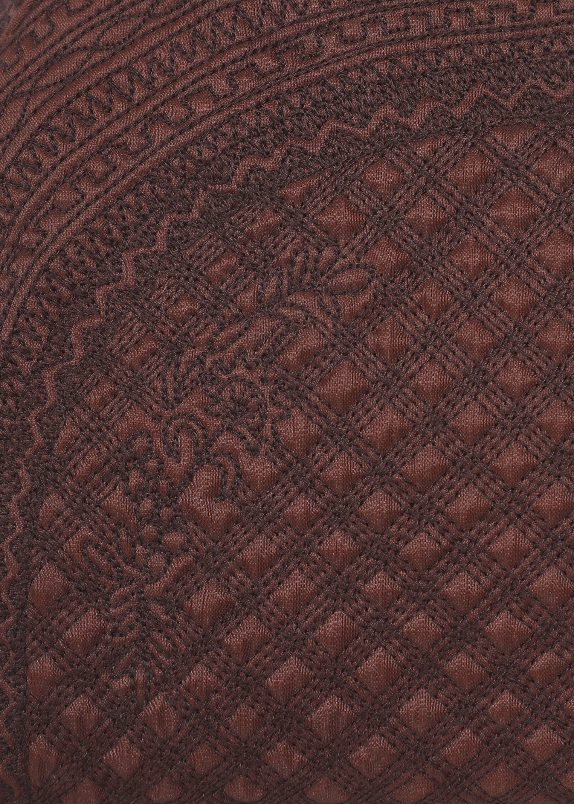 Zoomed view Close-up of dark brown BLOOM & PLAID BOSTON fabric by HaaT, featuring intricate Bhill embroidery with diamond motifs and ornate borders, highlighting the textured and decorative surface masterfully crafted by Indian artisans.
