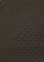 Close-up of dark brown textured fabric featuring diamond-shaped stitching and intricate, swirling Bhill embroidery patterns that create a detailed, decorative design—perfect for the BLOOM & PLAID BOSTON bag by HaaT, crafted in India.