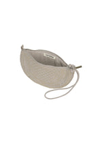 Beige embroidered wristlet pouch with zipper closure, featuring intricate Bhill embroidery and a small tag reading HaaT, complete with a wrist strap, photographed from above on a white background. This elegant BLOOM & PLAID BOSTON pouch is proudly made in India.