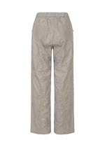 Back view of HaaT DELICATE FLORAL BHILL light beige nylon pants with Bhill embroidery, botanical patterns, elastic waistband, straight legs, and two back pockets.