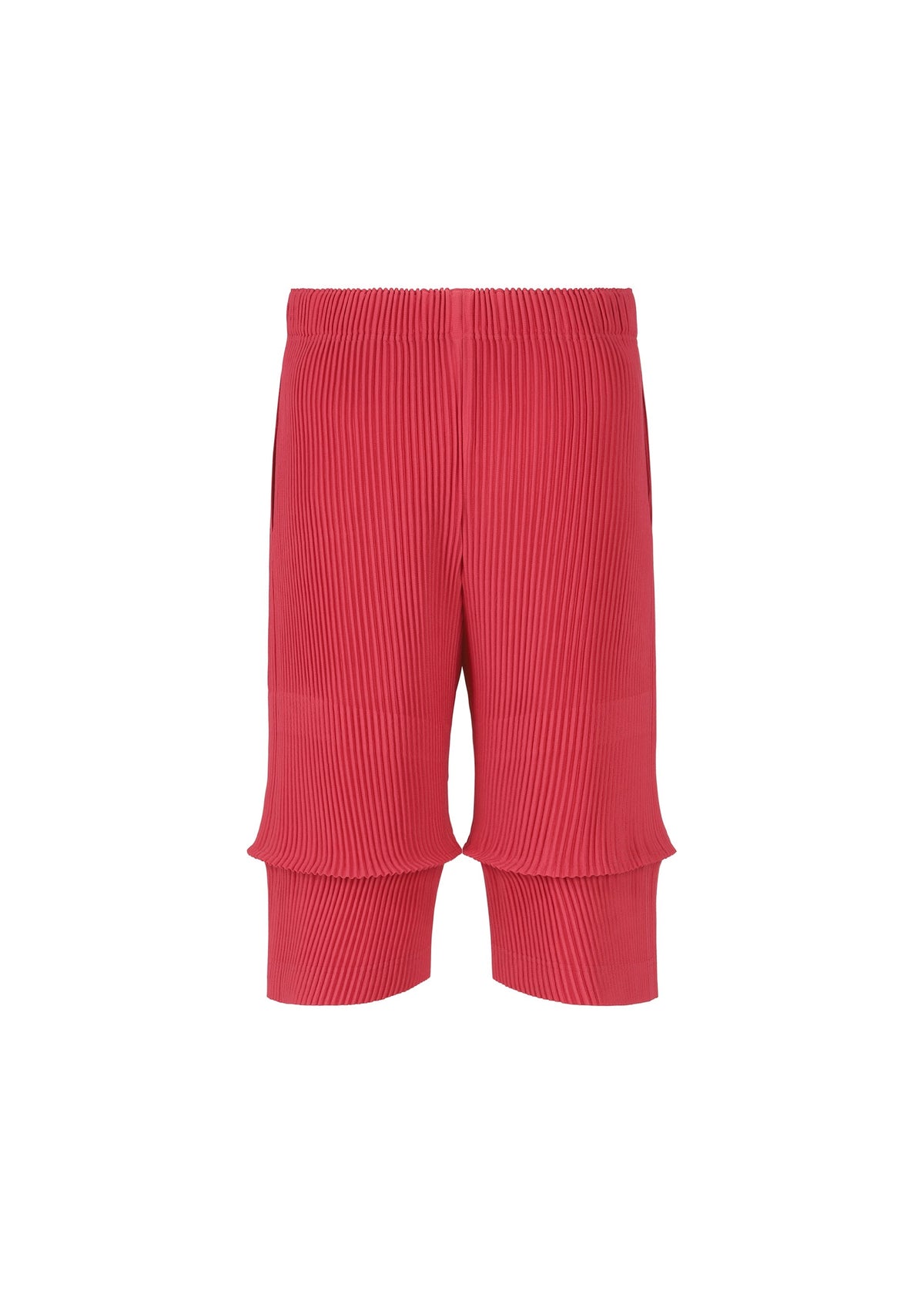 The HOMME PLISSÉ ISSEY MIYAKE PLEATS BOTTOMS 2 are bright pink, knee-length shorts with ribbed, pleated fabric and an elastic waistband, combining style and comfort. Displayed on a plain white background. view 4 of 8