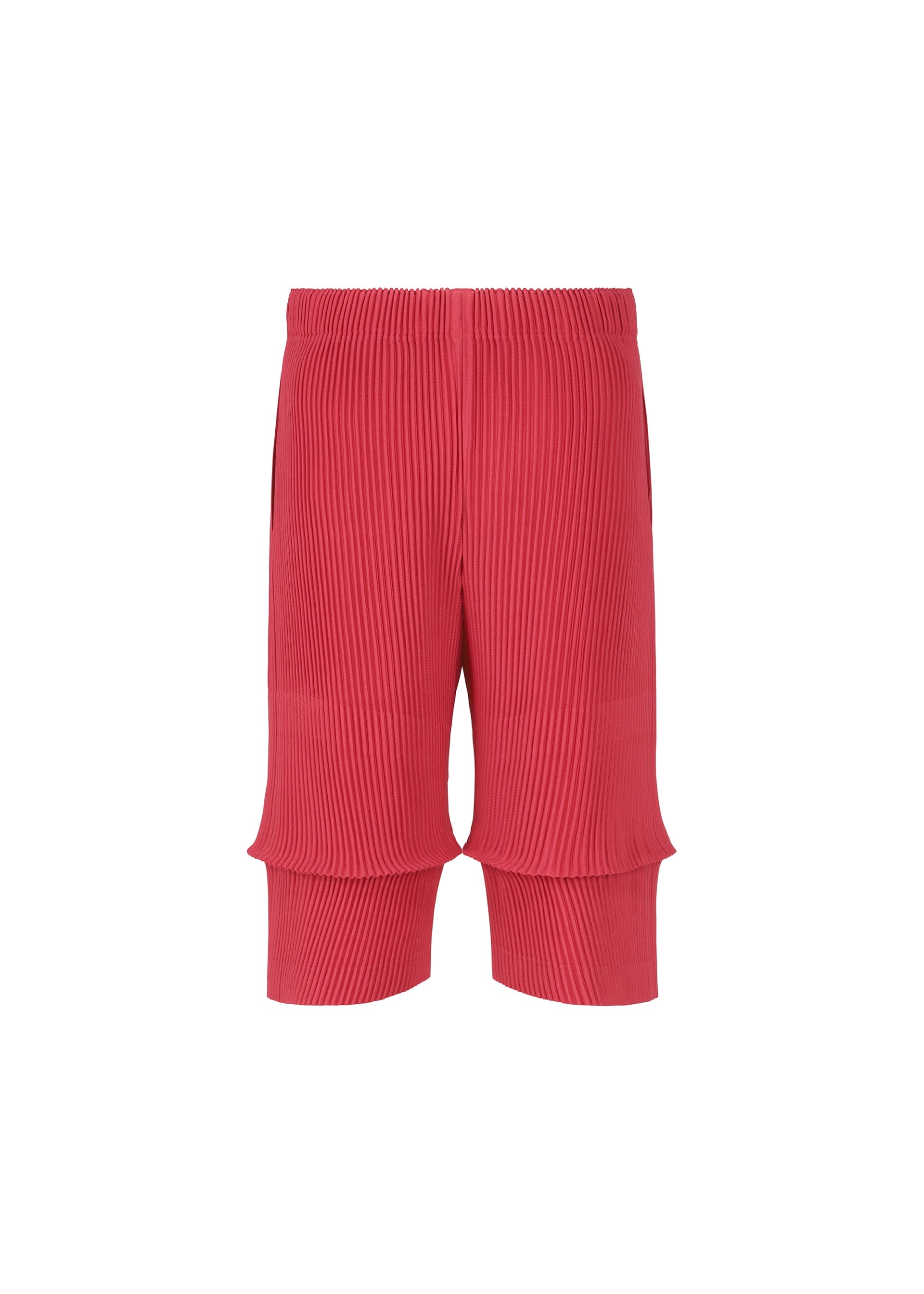 Zoomed view The HOMME PLISSÉ ISSEY MIYAKE PLEATS BOTTOMS 2 are bright pink, knee-length shorts with ribbed, pleated fabric and an elastic waistband, combining style and comfort. Displayed on a plain white background.