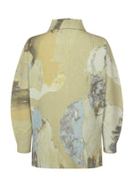 The PAINTED STONE top by HOMME PLISSÉ ISSEY MIYAKE features long sleeves, a ribbed texture, and a high collar with an abstract stone pattern in beige, blue, and cream. The image shows the back of the garment.