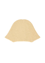 The CROCHET HAT by HOMME PLISSÉ ISSEY MIYAKE is a beige, woven bucket hat with a wide flared brim and textured crocheted look, shown against a white background. - BEIGE （no.40）