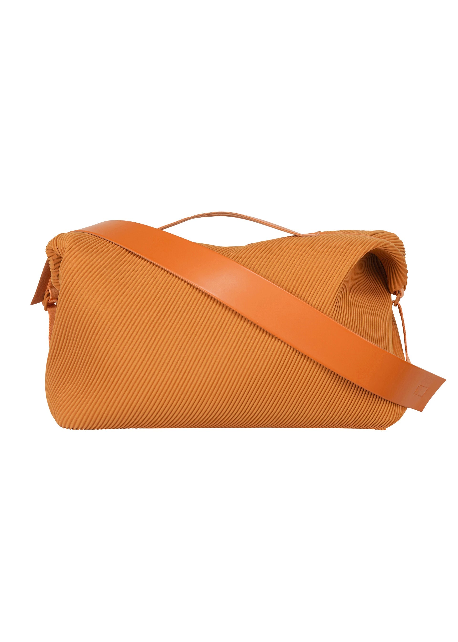 Zoomed view The PLEATS TRAVEL BAG by HOMME PLISSÉ ISSEY MIYAKE features an orange ribbed exterior, large capacity, soft rectangular shape, wide smooth leather shoulder strap, and a small top handle.