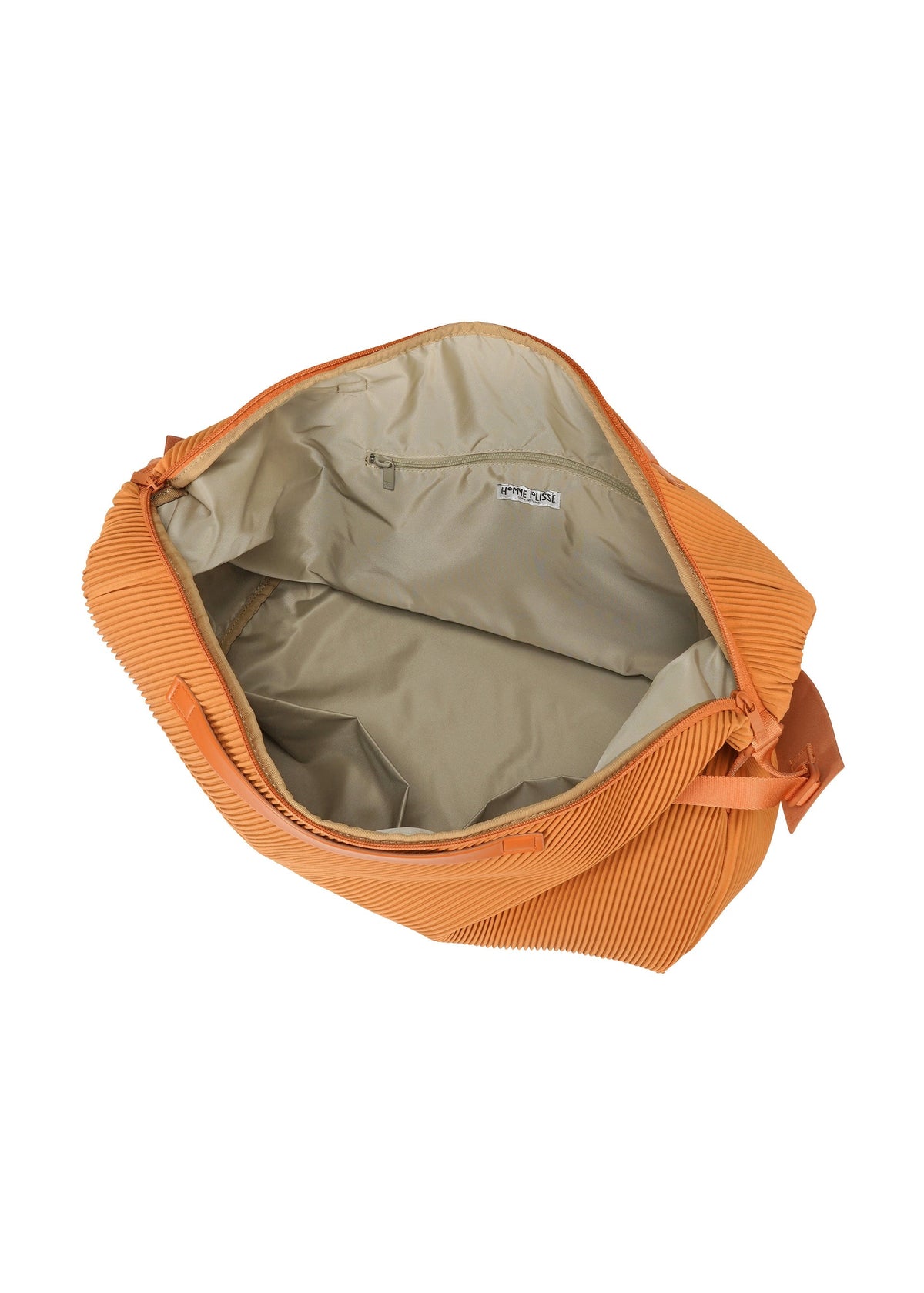 The HOMME PLISSÉ ISSEY MIYAKE PLEATS TRAVEL BAG is an open orange pleated handbag with beige lining, a shoulder strap, a roomy interior, and a small zip pocket, showcased on a white background. view 6 of 6