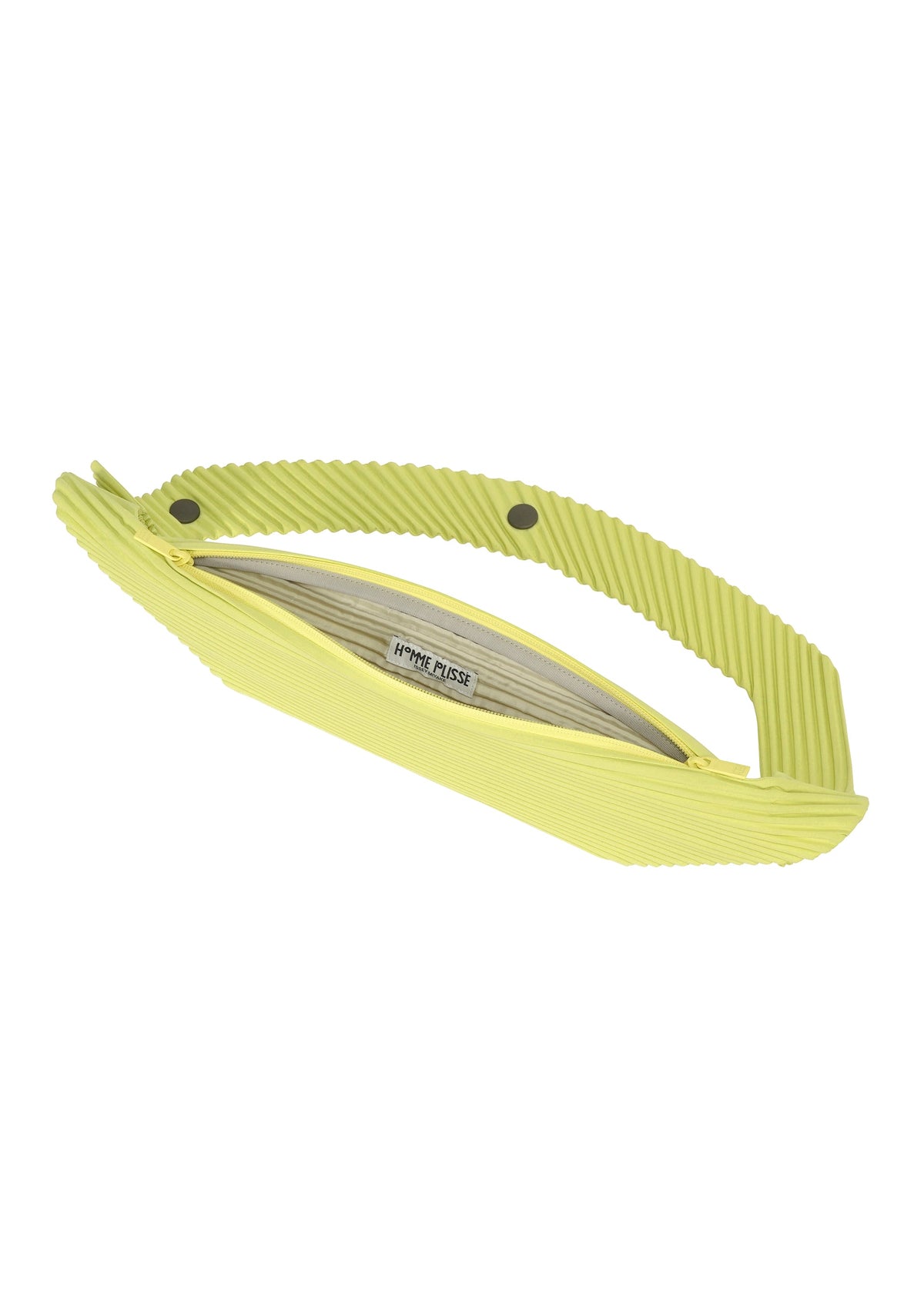 A lime green, ribbed VERSATILE CROSSBODY by HOMME PLISSÉ ISSEY MIYAKE with a matching handle and zipper, shown on a white background. The bag is partly unzipped to reveal an inner label. view 6 of 8