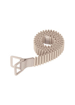 The HOMME PLISSÉ ISSEY MIYAKE PLEATS BELT, in beige textured fabric with a zigzag pattern, is shown coiled on a white background. It features an adjustable size, matching rectangular buckle, and leather detail near the clasp.