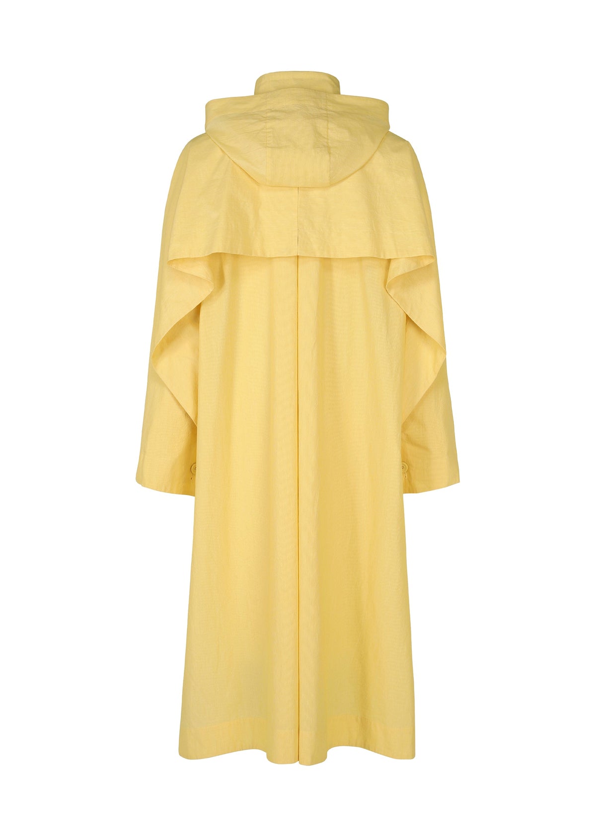 The FRESHEN raincoat by HOMME PLISSÉ ISSEY MIYAKE is displayed from the back. This long, light yellow hooded coat features wide sleeves, a large back yoke, a relaxed fit, and a subtle wrinkled texture against a white background. view 4 of 9