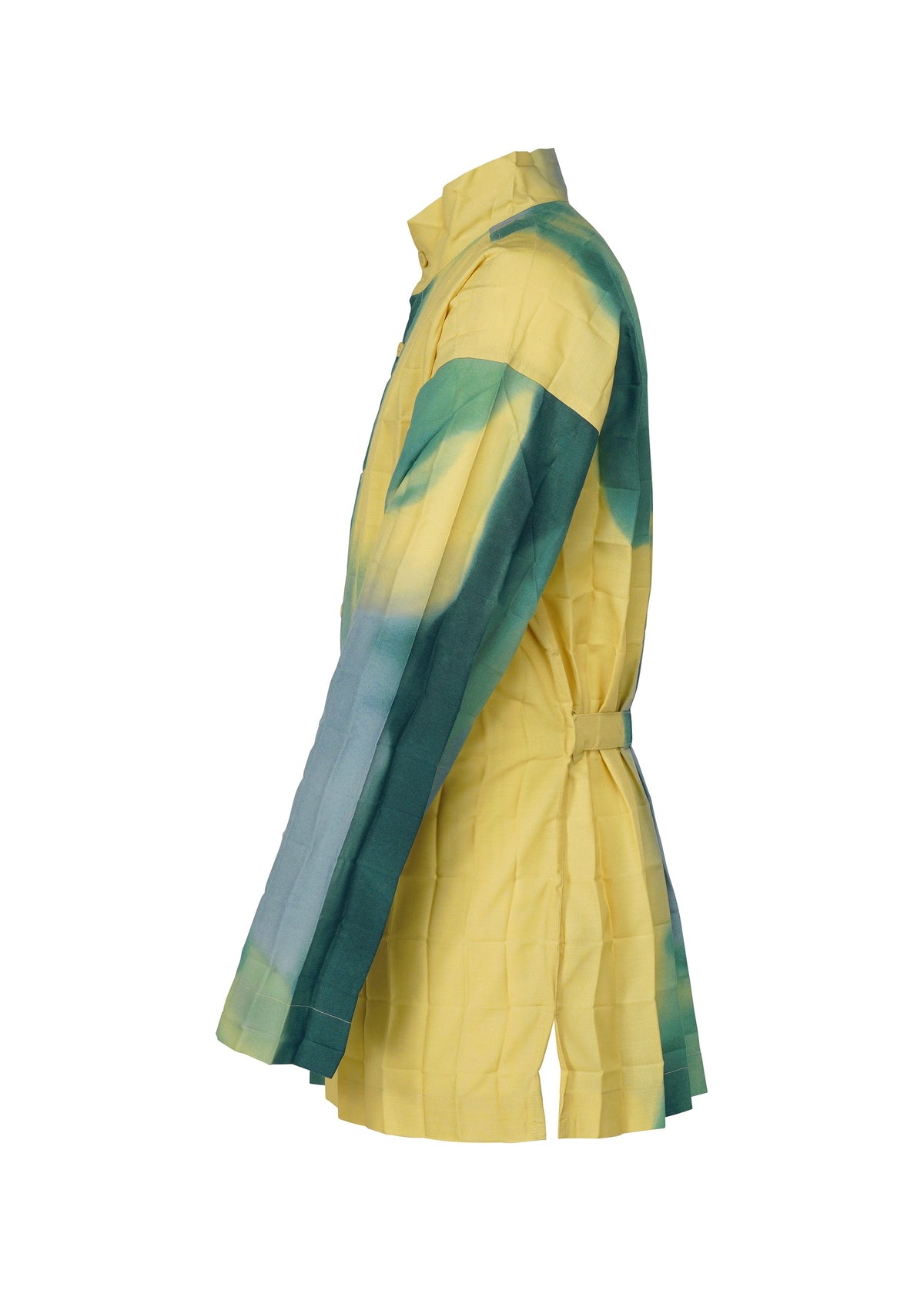 The DAWN EDGE SHIRT by HOMME PLISSÉ ISSEY MIYAKE is a long-sleeved, collared jacket with a yellow and green gradient checkered fabric, Nassen printing, and a belted waist, shown in side profile on a white background. view 5 of 10