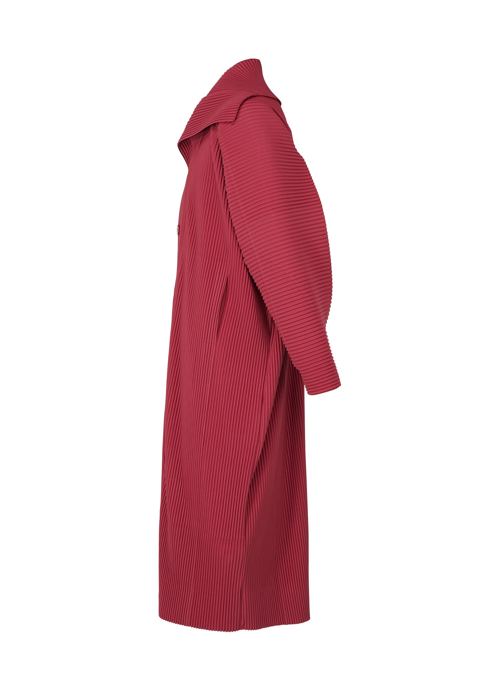 Zoomed view The MONTHLY COLORS : JANUARY coat by HOMME PLISSÉ ISSEY MIYAKE is a long, textured red piece with wide lapels and ribbed, quick-drying polyester fabric, shown in a side view against a white background.