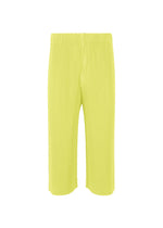 The MONTHLY COLORS : MAY pants by HOMME PLISSÉ ISSEY MIYAKE feature a bright yellow ribbed knit, elastic waistband, and wide-leg cropped silhouette, shown against a plain white background. - ZUCCHINI YELLOW （no.53）