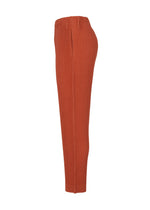 Side view of the TAILORED PLEATS 3 high-waisted, straight pants in rust by HOMME PLISSÉ ISSEY MIYAKE, featuring vertical pleats and quick-drying polyester, displayed against a white background.