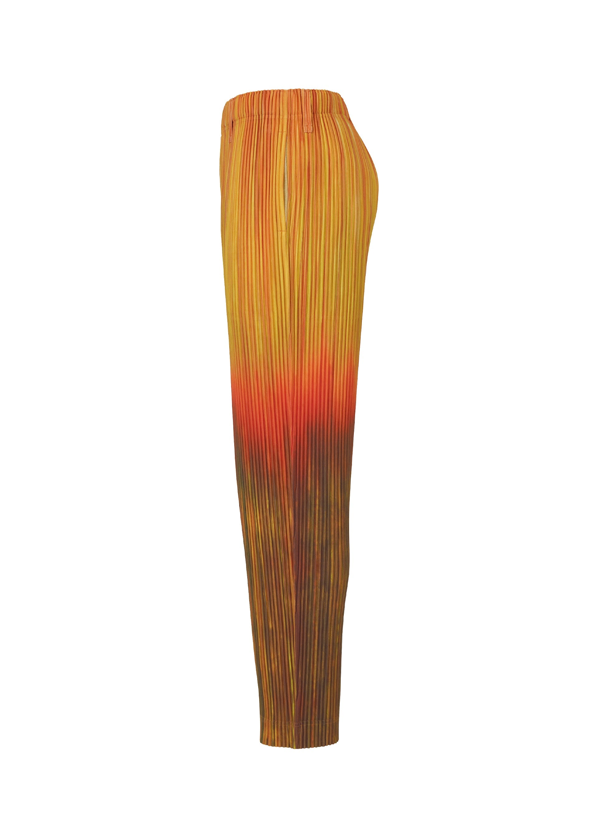 Zoomed view Side view of HOMME PLISSÉ ISSEY MIYAKE PAINT BRUSH CLOSE-UP pleated pants with an elastic waistband, slim fit, and a unique color gradient from yellow to orange and brown, highlighting the distinctive patterned fabric.