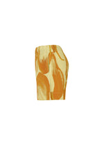 Side view of the FRUITS & VEGETABLES high-waisted ribbed skirt by HOMME PLISSÉ ISSEY MIYAKE, featuring an abstract yellow and orange swirl print on white, inspired by Italian market motifs.