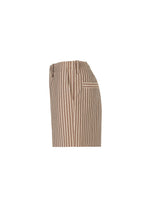 Side view of HOMME PLISSÉ ISSEY MIYAKE STRIPE JERSEY shorts in beige with vertical brown stripes, elastic waistband, side pocket, and single back pocket, displayed on a plain white background.