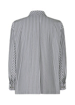 Back view of the HOMME PLISSÉ ISSEY MIYAKE STRIPE JERSEY shirt, featuring vertical black and white stripes, buttoned cuffs, an Italian collar, relaxed fit, and a central back pleat.