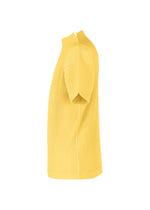 Side view of MONTHLY COLORS : MARCH by HOMME PLISSÉ ISSEY MIYAKE—a yellow, short-sleeved, ribbed mock-neck top with sculpted sleeves, textured quick-drying polyester fabric, and a straight hem. Set against a plain white background.