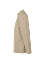 Side view of the beige INLAID KNIT jacket by HOMME PLISSÉ ISSEY MIYAKE, featuring long sleeves, a subtle herringbone pattern, round collar, and two large front pockets, displayed on a plain white background.