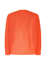 The BRUSH CLOSE-UP KNIT by HOMME PLISSÉ ISSEY MIYAKE is a bright orange, long-sleeved top shown from the back, with a vertical textured pattern and ribbed cuffs and hem, made from extra-long-staple cotton for softness.