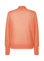 The KNIT UNRAVELED by HOMME PLISSÉ ISSEY MIYAKE is a coral round-neck, long-sleeved sweater shown from the back, featuring ribbed cuffs, waistband, and neckline.