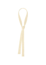 A single MESH PLEATS TIE by HOMME PLISSÉ ISSEY MIYAKE is loosely knotted, resembling a delicate lace necktie, with both ends draping down against a plain white background. - WHITE （no.01）