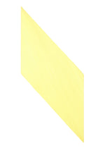 A single PLEATS STOLE by HOMME PLISSÉ ISSEY MIYAKE is shown diagonally on a white background. The stole is rectangular, pale yellow, and features gently ridged edges, resembling an uncooked lasagna noodle with its delicate texture and elegant form.