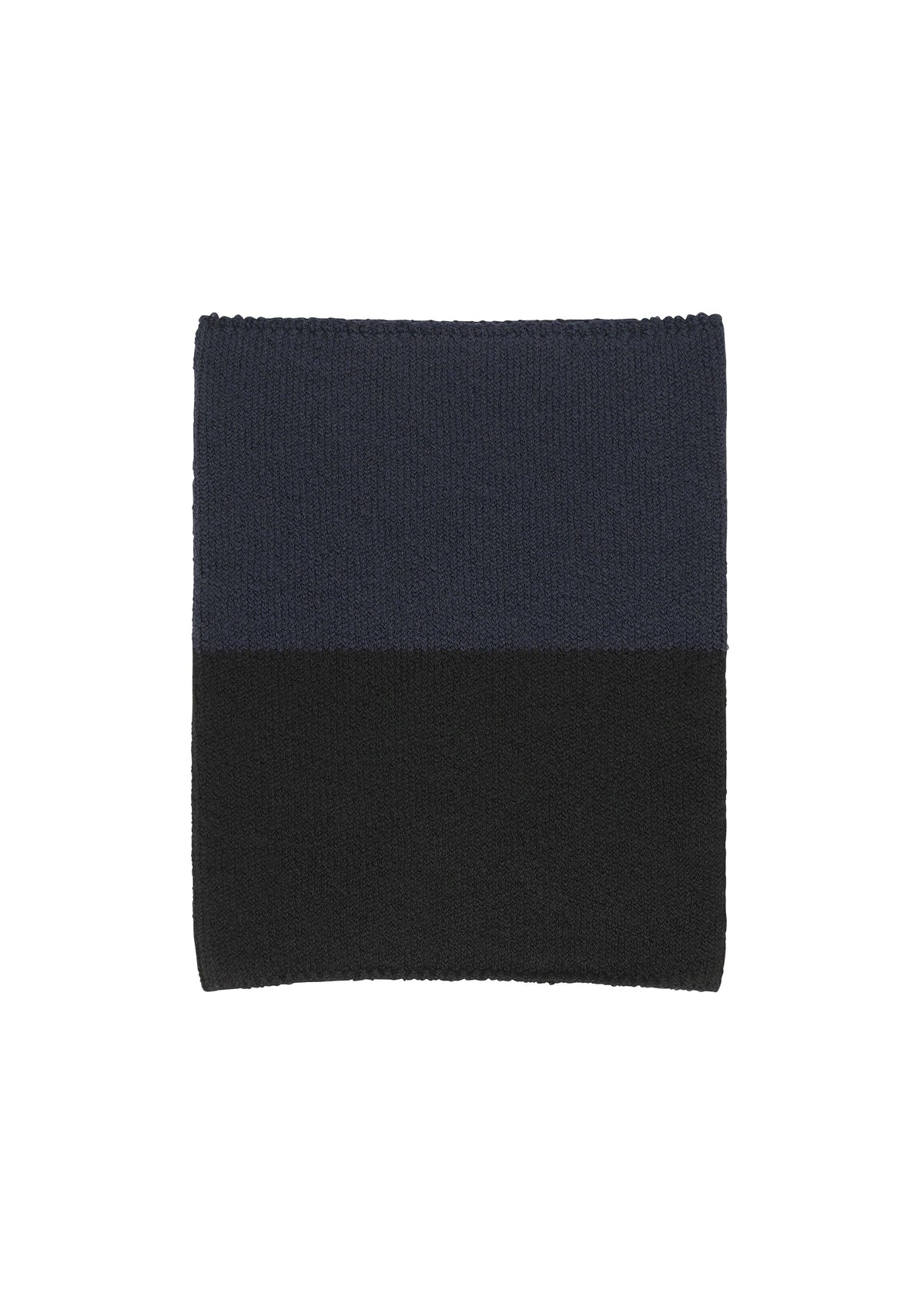 The WINTER GEAR : COLOR BLOCK by HOMME PLISSÉ ISSEY MIYAKE is a square, knitted neck warmer featuring dark blue on top and black on the bottom, shown on a white background. view 2 of 3
