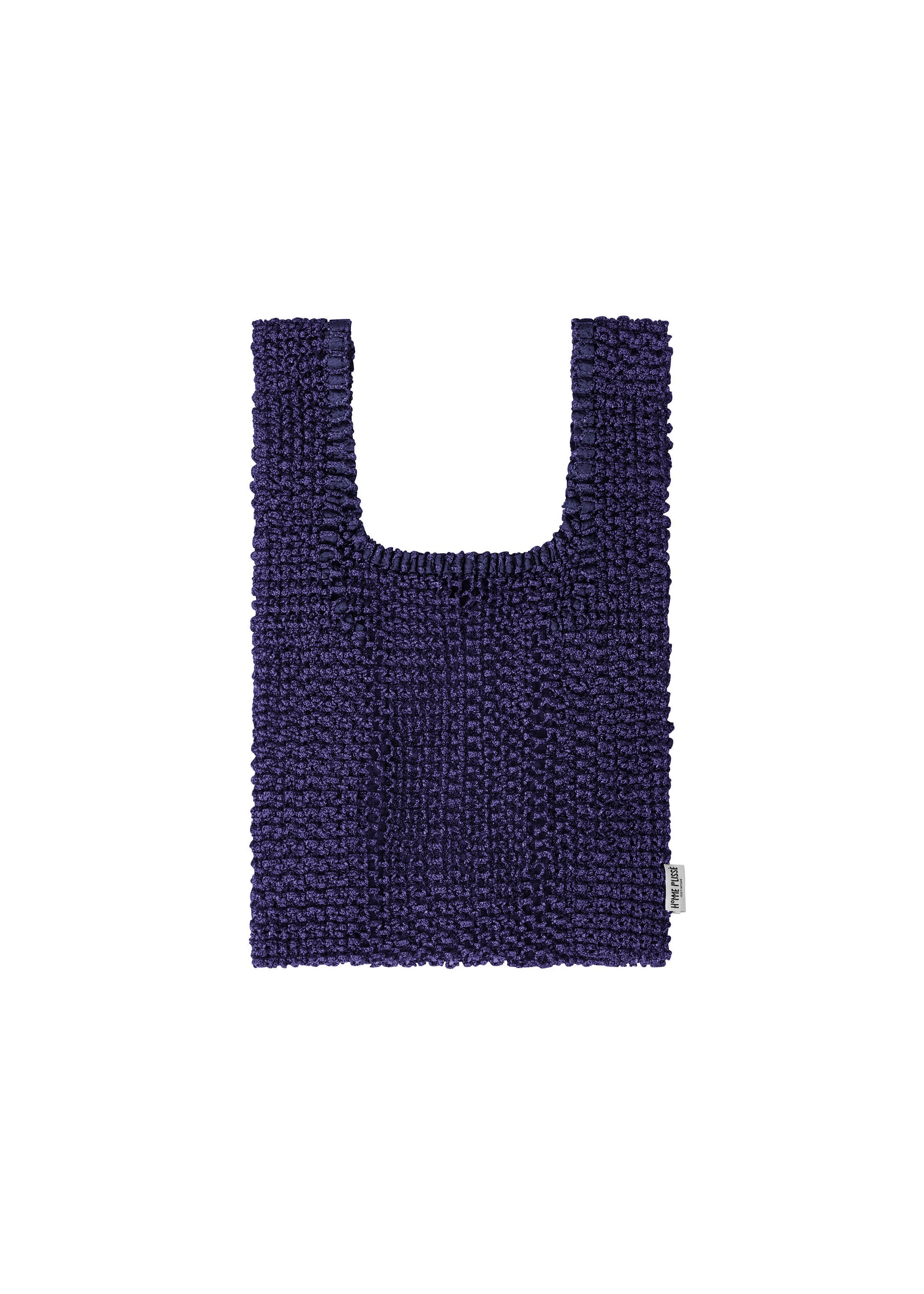 Zoomed view The MESH PLEATS BAG by HOMME PLISSÉ ISSEY MIYAKE is a deep purple, rectangular tote with short handles and a textured knit design that highlights minimalist craftsmanship. Detailed with a small white tag on the lower right side, the bag is presented against a white background. - BLUE （no.72）