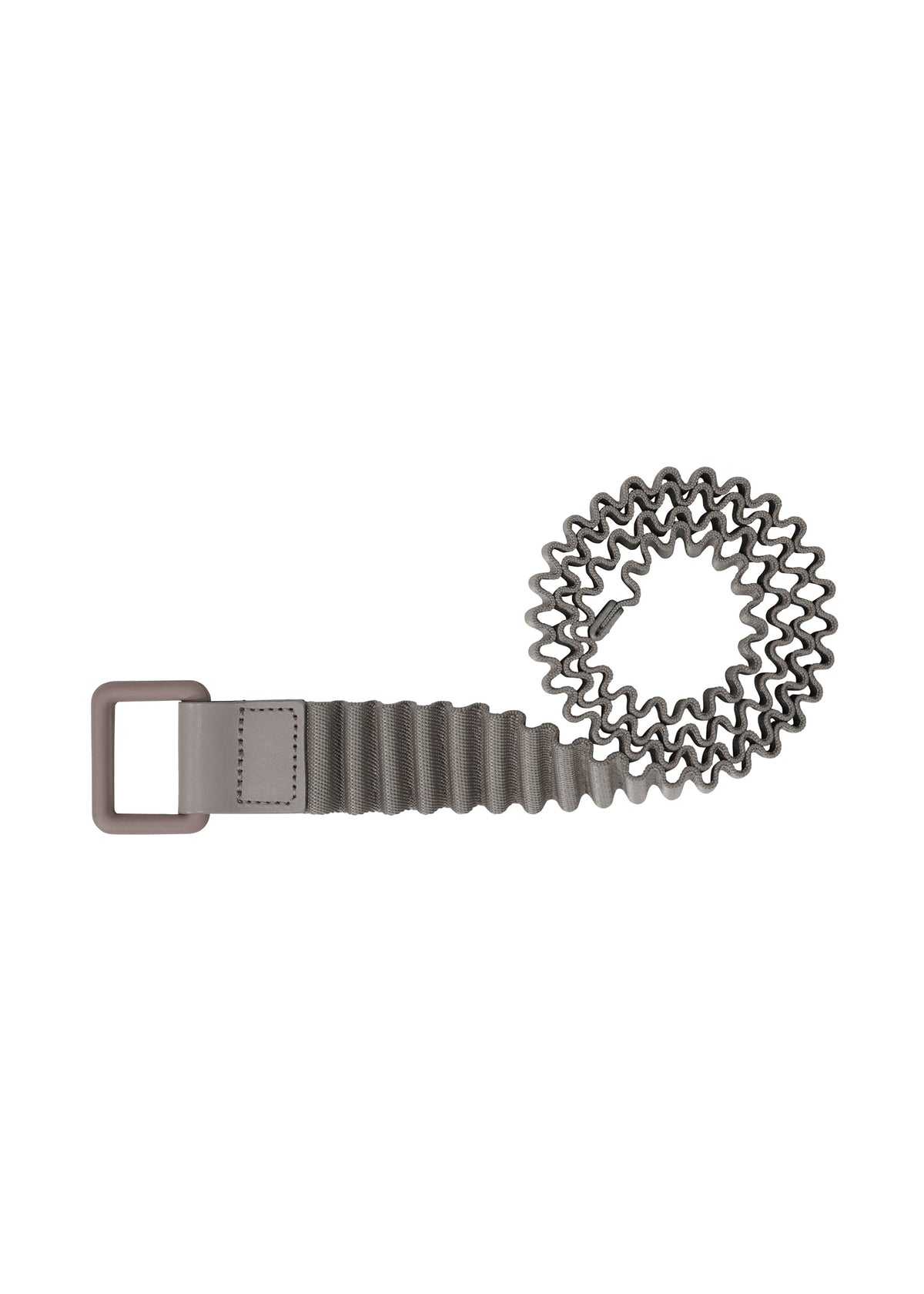 Zoomed view The PLEATS BELT by HOMME PLISSÉ ISSEY MIYAKE features wavy gray pleats and a rectangular matte taupe buckle, laid in a spiral on white—a versatile accessory for any look. - GRAY （no.12）