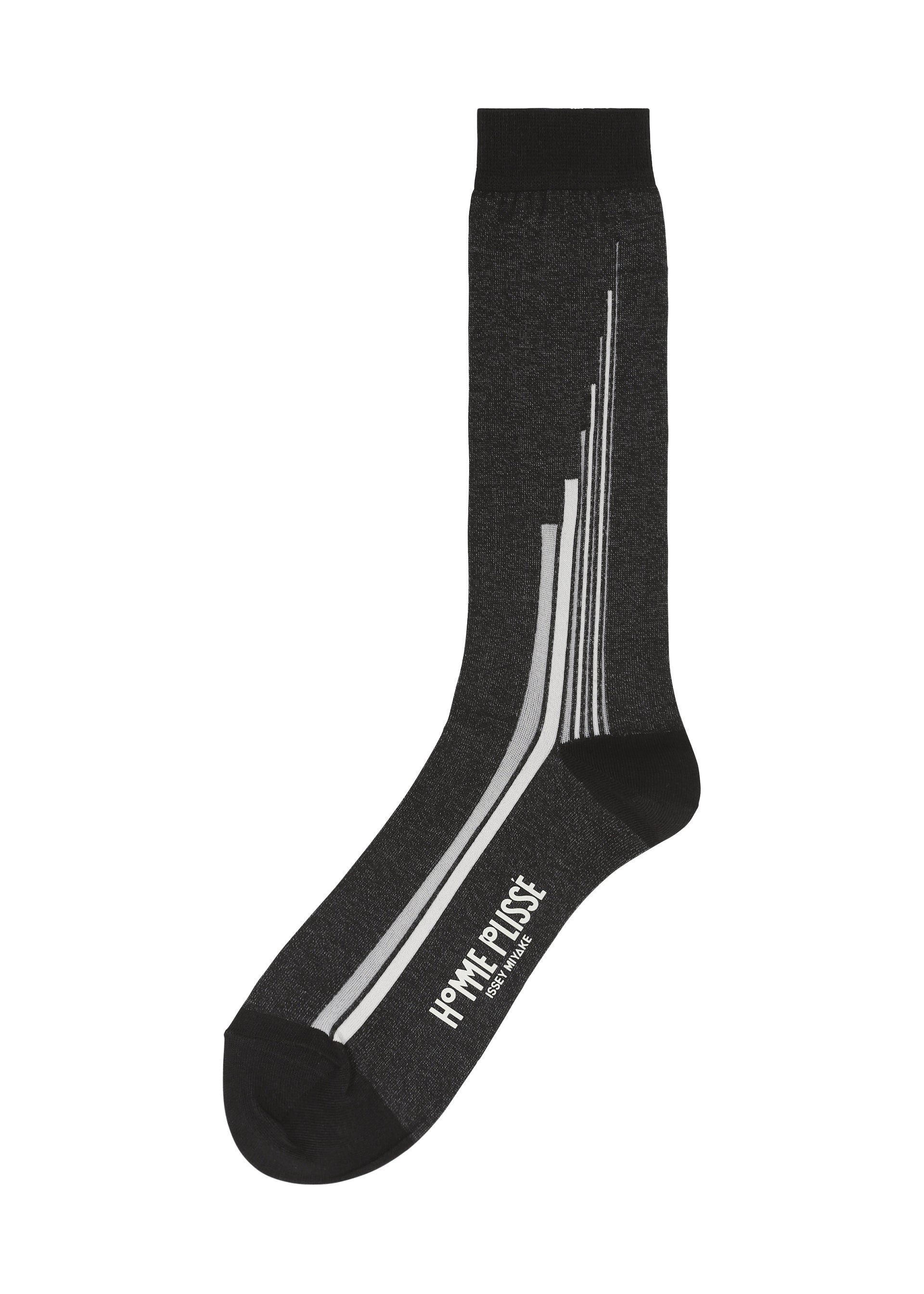 Zoomed view A single RAY SOCKS by HOMME PLISSÉ ISSEY MIYAKE in dark gray, designed with black toe and cuff, vertical white textured lines, and “HOMME PLISSÉ ISSEY MIYAKE” printed in white near the sole. - BLACK （no.15）
