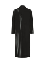 The IN THE SHADOW by HOMME PLISSÉ ISSEY MIYAKE is a long black pleated jacket with vertical ribbing, subtle highlights, a straight back silhouette, and three-quarter length sleeves.