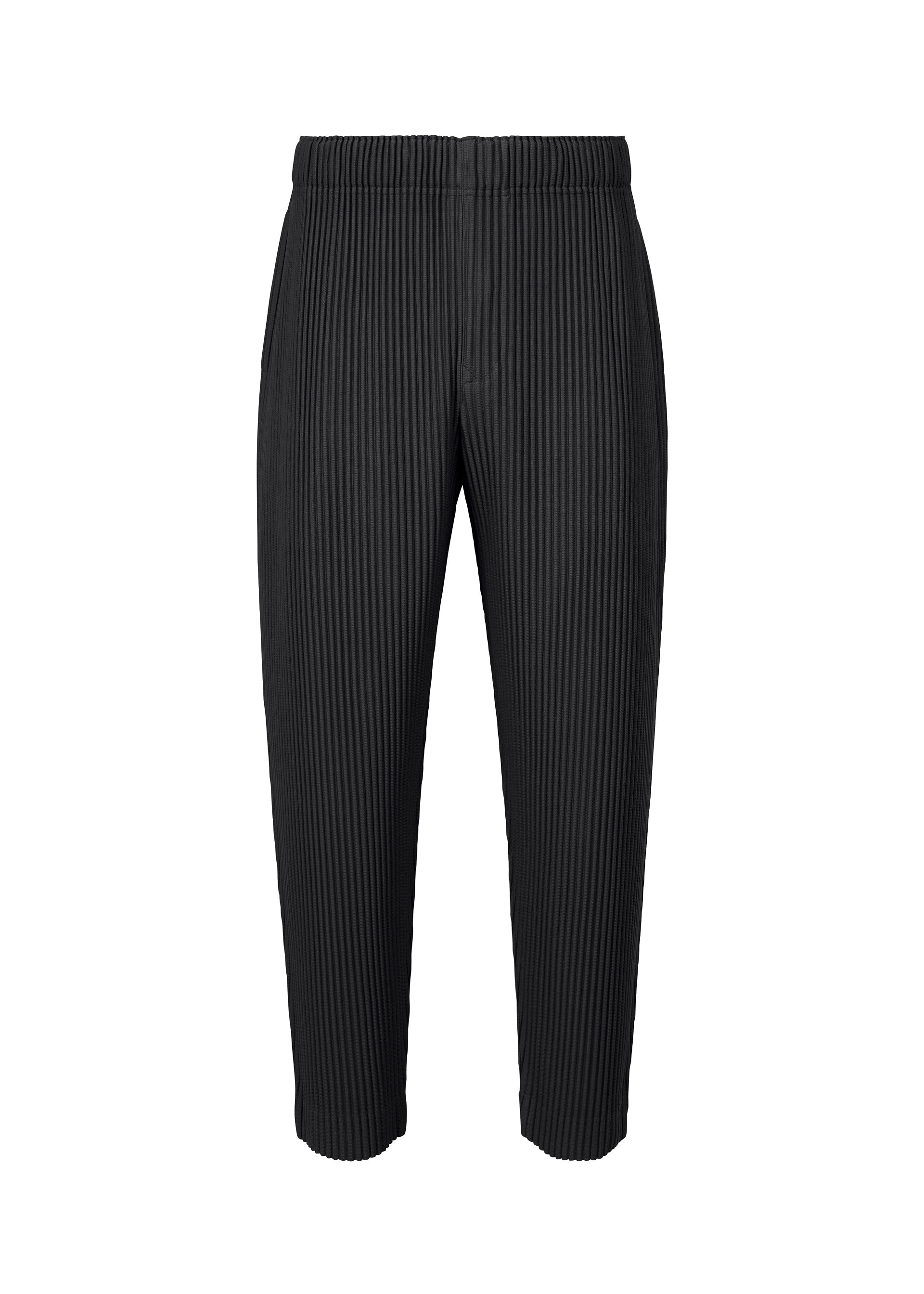 Zoomed view The MONTHLY COLORS : AUGUST pants by HOMME PLISSÉ ISSEY MIYAKE feature a black, cropped design with a vertical pinstripe pleated texture, an elastic waistband, and a straight, relaxed fit. These quick-drying pants provide lightweight comfort for all-day wear and are photographed against a plain white background. - BLACK （no.15）