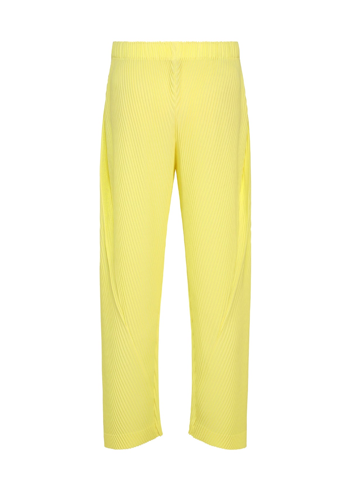 The SLASH pants by HOMME PLISSÉ ISSEY MIYAKE are yellow, full-length pants featuring diagonal pleats, an elastic waistband, and a relaxed fit, shown against a white background. view 4 of 7