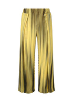 The BLEND OF LIGHTS pants by HOMME PLISSÉ ISSEY MIYAKE feature a wide-leg, high-waisted design with yellow and black vertical stripes, pleated texture, and a classic button-fly closure, shown against a white background.