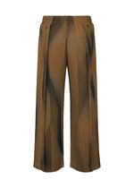 The BLEND OF LIGHTS wide-leg pants by HOMME PLISSÉ ISSEY MIYAKE feature a high-waisted, relaxed fit in brown with black stripes, side waistband buttons, and a flowing silhouette.