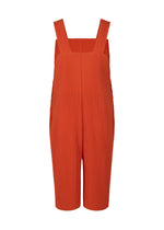 The PLEATS BOTTOMS 1 by HOMME PLISSÉ ISSEY MIYAKE features a vibrant orange hue, sleeveless pleated design, wide straps, vertical ribbed texture, button-fly front, and modern knee-length shorts.
