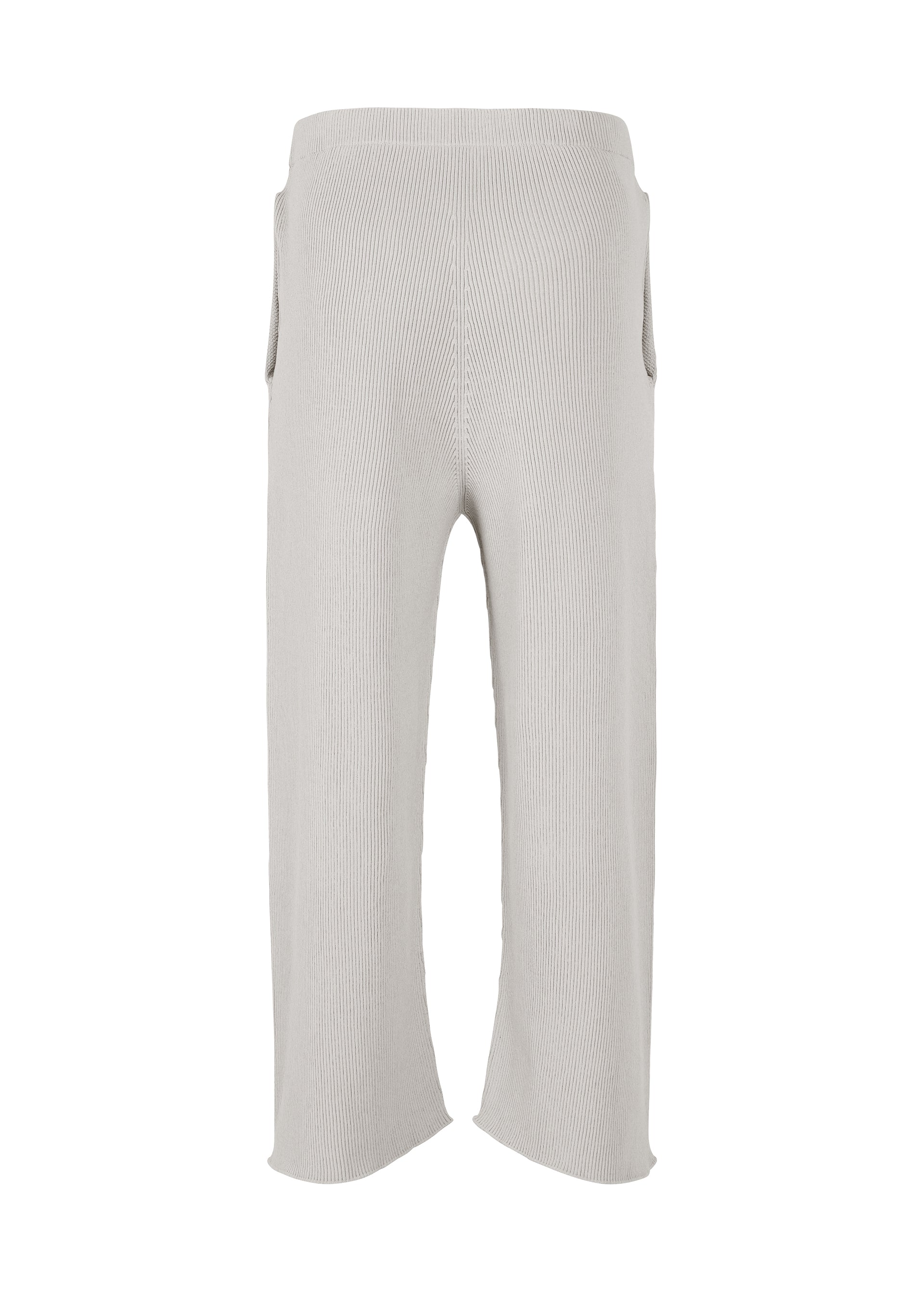 Zoomed view The BASIC KNIT pants by HOMME PLISSÉ ISSEY MIYAKE are light gray, ribbed knitwear trousers featuring a wide leg, cropped length, and high waist. Made from regenerated thread, they have an elastic waistband and provide a relaxed, comfortable fit.