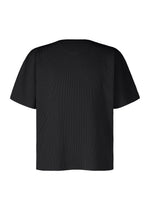 The BASIC KNIT by HOMME PLISSÉ ISSEY MIYAKE is shown from the back against a white background. This black short-sleeve top features a round neckline and showcases a minimalist design with no visible logos, graphics, or patterns, embodying an understated approach to everyday knitwear. - BLACK （no.15）