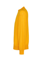 The KNIT UNRAVELED long-sleeve top by HOMME PLISSÉ ISSEY MIYAKE is displayed from the side in a vibrant yellow hue, showcasing ribbed cuffs, hem, and collar against a plain white background—an ideal statement piece to brighten up any layered look.