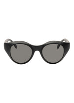 Front view of ISSEY MIYAKE EYES GRIT-BOSTON black Boston-style oval sunglasses with thick, rounded frames and dark tinted lenses against a white background.