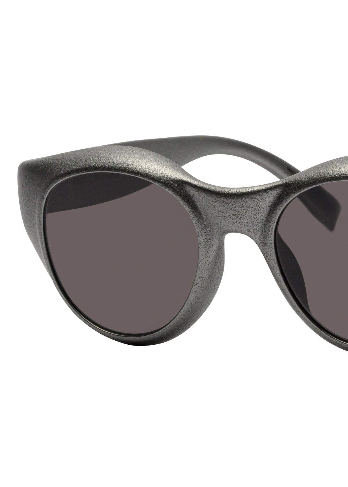 Close-up of the left half of ISSEY MIYAKE EYES GRIT-BOSTON sunglasses in matte black with dark lenses, set against a white background. view 3 of 5