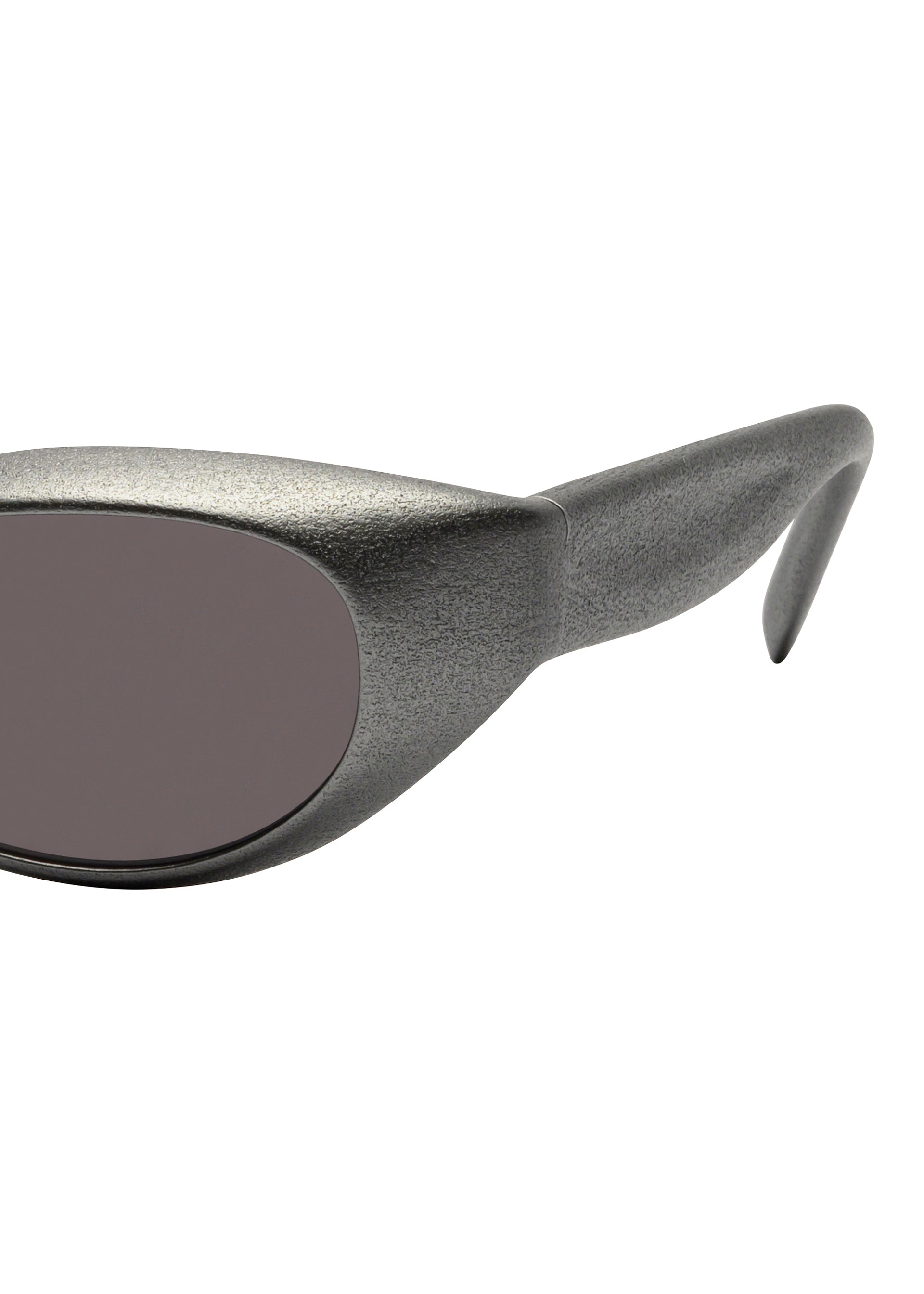 Zoomed view Close-up of the side of ISSEY MIYAKE EYES GRIT-SQUARE 3D printed sunglasses, featuring a textured metallic gray frame, dark oval lenses, and a thick arm.