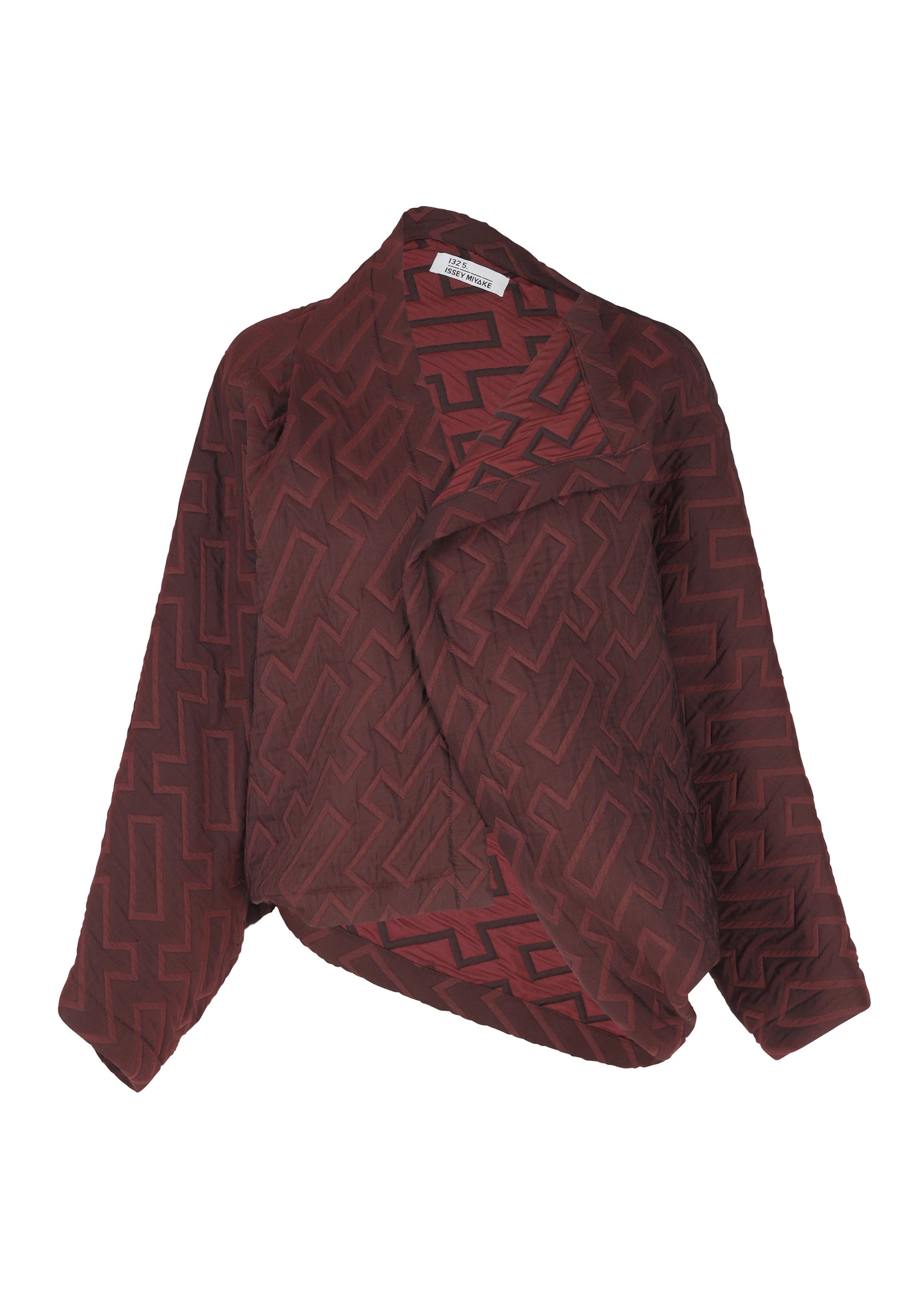 Zoomed view The ONE CLOTH PUFF by 132 5. ISSEY MIYAKE is a maroon jacquard jacket featuring long sleeves, an abstract geometric pattern, asymmetric front, and a relaxed draped silhouette for a soft feel. - BORDEAUX （no.84）
