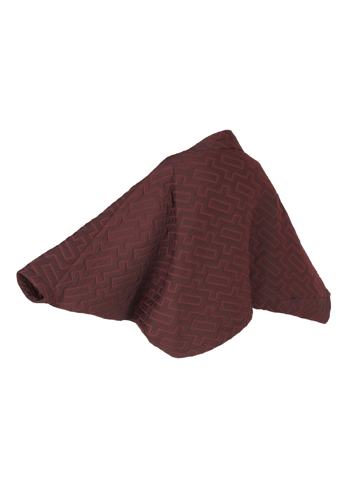 The ONE CLOTH PUFF by 132 5. ISSEY MIYAKE, featuring maroon fabric with a geometric pattern and soft texture, is draped and partially folded against a white background. view 4 of 9