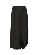 The SEAMLESS BOTTOMS by 132 5. ISSEY MIYAKE are black, wide-leg culottes featuring a draped asymmetrical wrap and button waist, crafted from recycled polyester for a comfortable, skirt-like look with a relaxed fit. Shown on a white background. - Gray (no. 13)